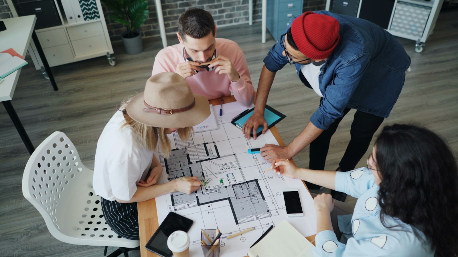 Team reviewing a floor plan